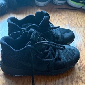 Kyrie Irving Limited Nike Kids All-Black Sneakers
